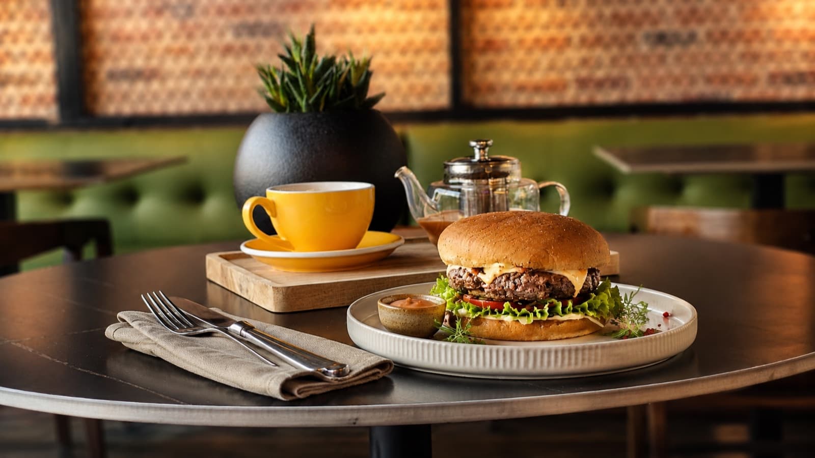Classic Beef Burger served with a coffee and teapot